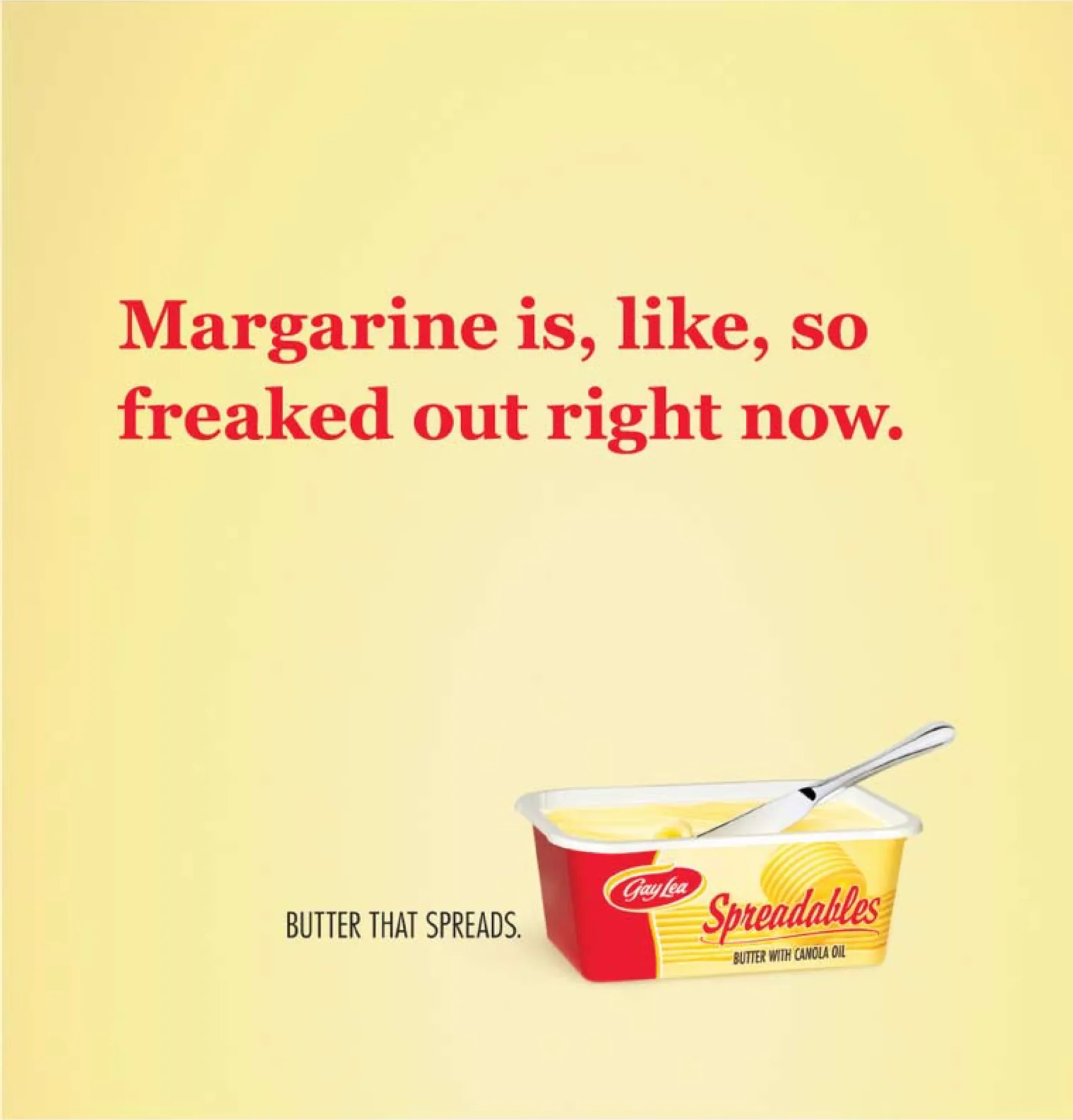 A print ad on a pale yellow background: "Margarine is, like, so freaked out right now." above a tub of Gay Lea Spreadables, with the line Butter that spreads.
